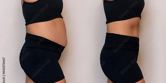 A man lifting a weight during a bicep curl.