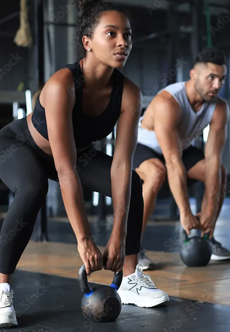 Man exercising with weighted ball