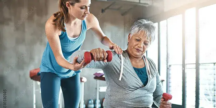 Women being instructed by trainer